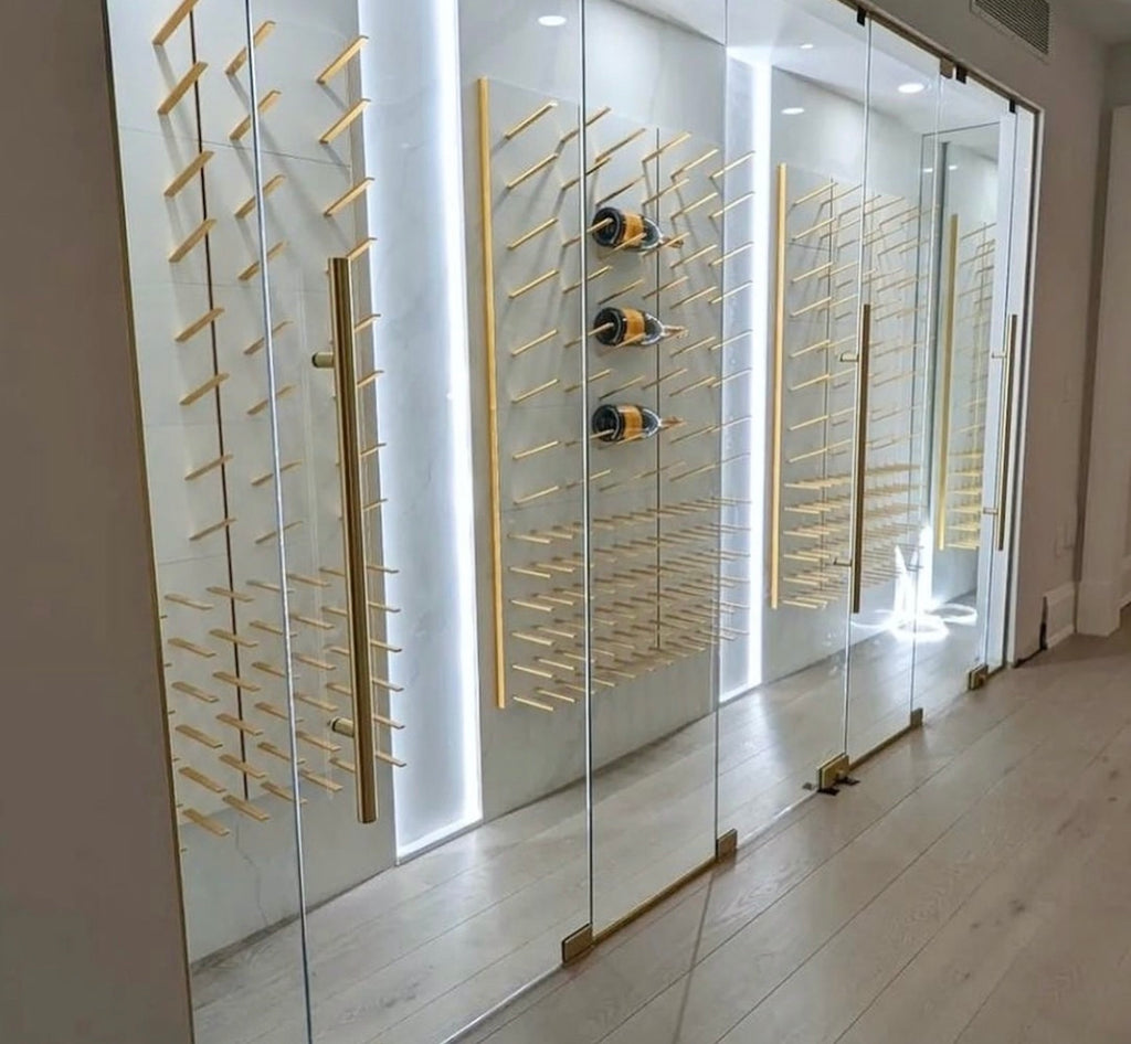 luxury wine room finished in white & gold