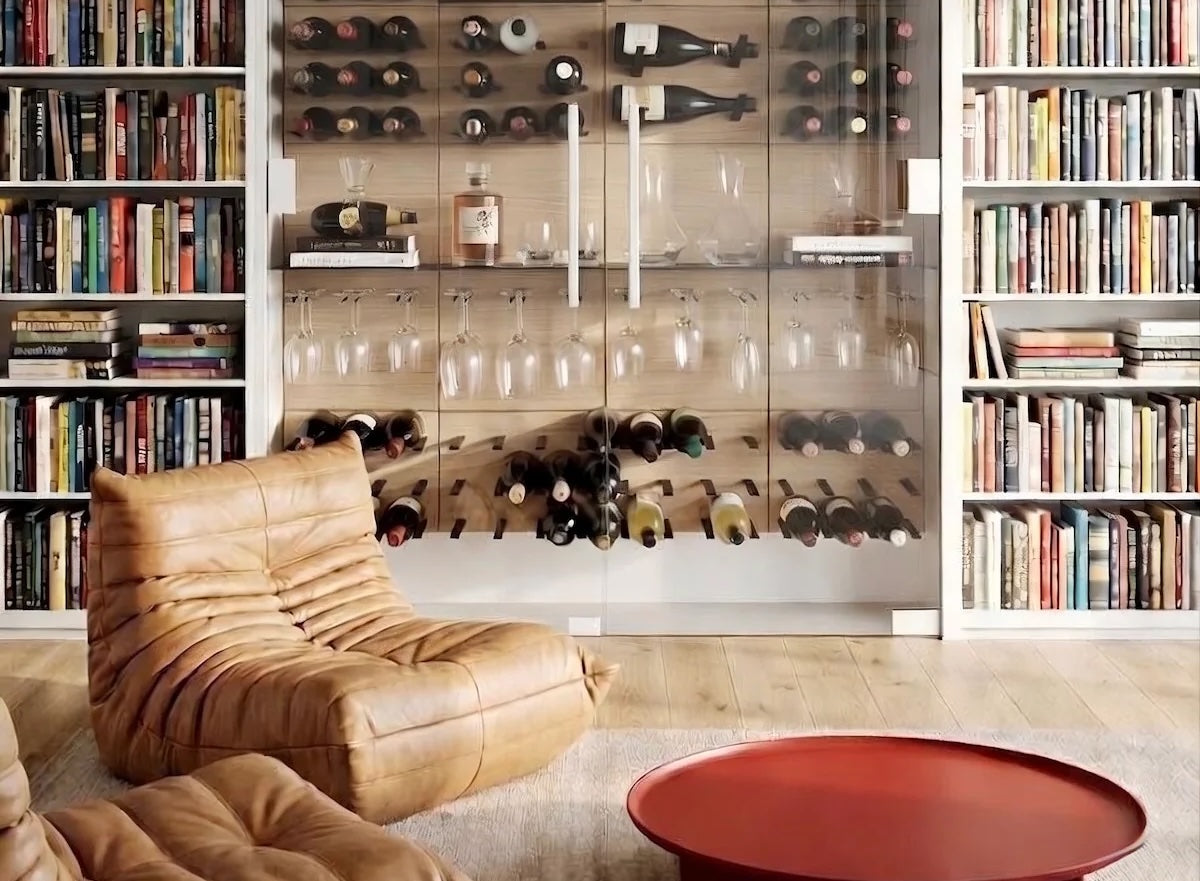 Glass-fronted home library wine wall with STACT Premier Oak & Black integrated stemware storage.