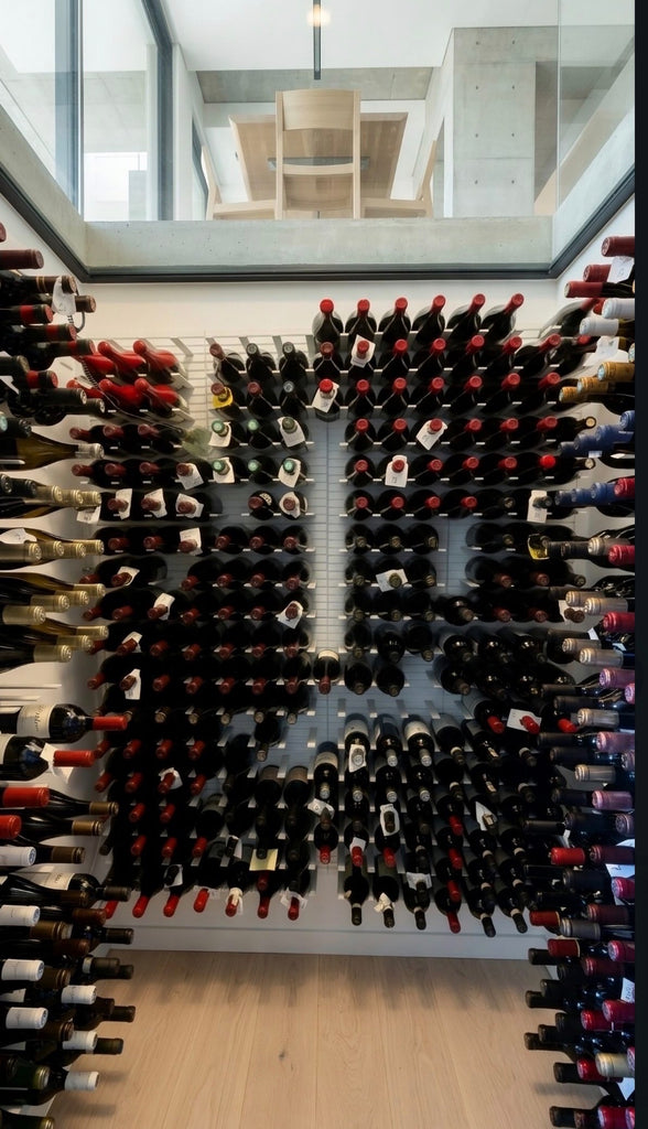 A modern underground wine cellar with glass ceiling.