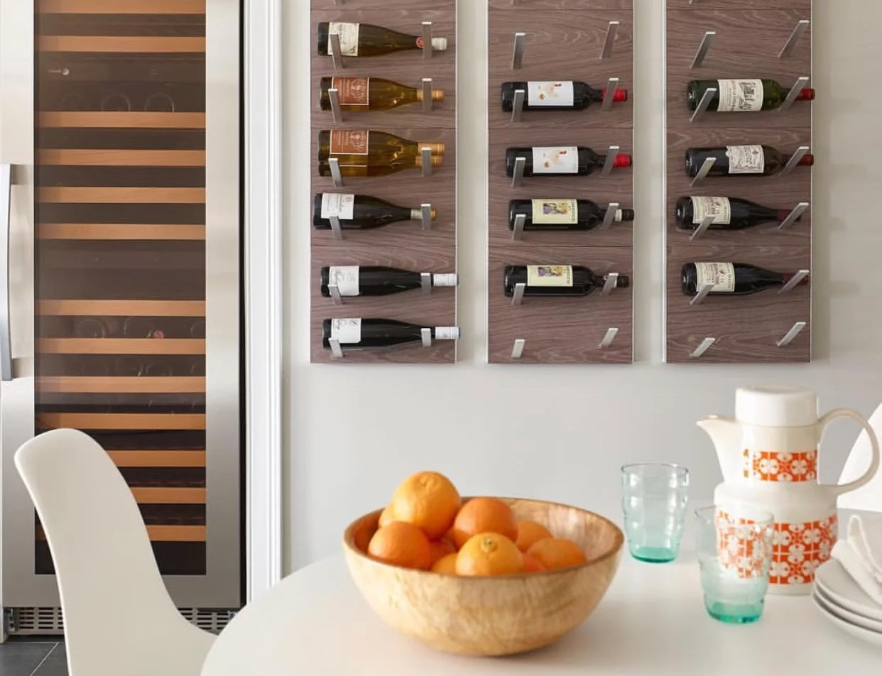 STACT Premier Gray Oak & Silver wine wall in a modern dining space.