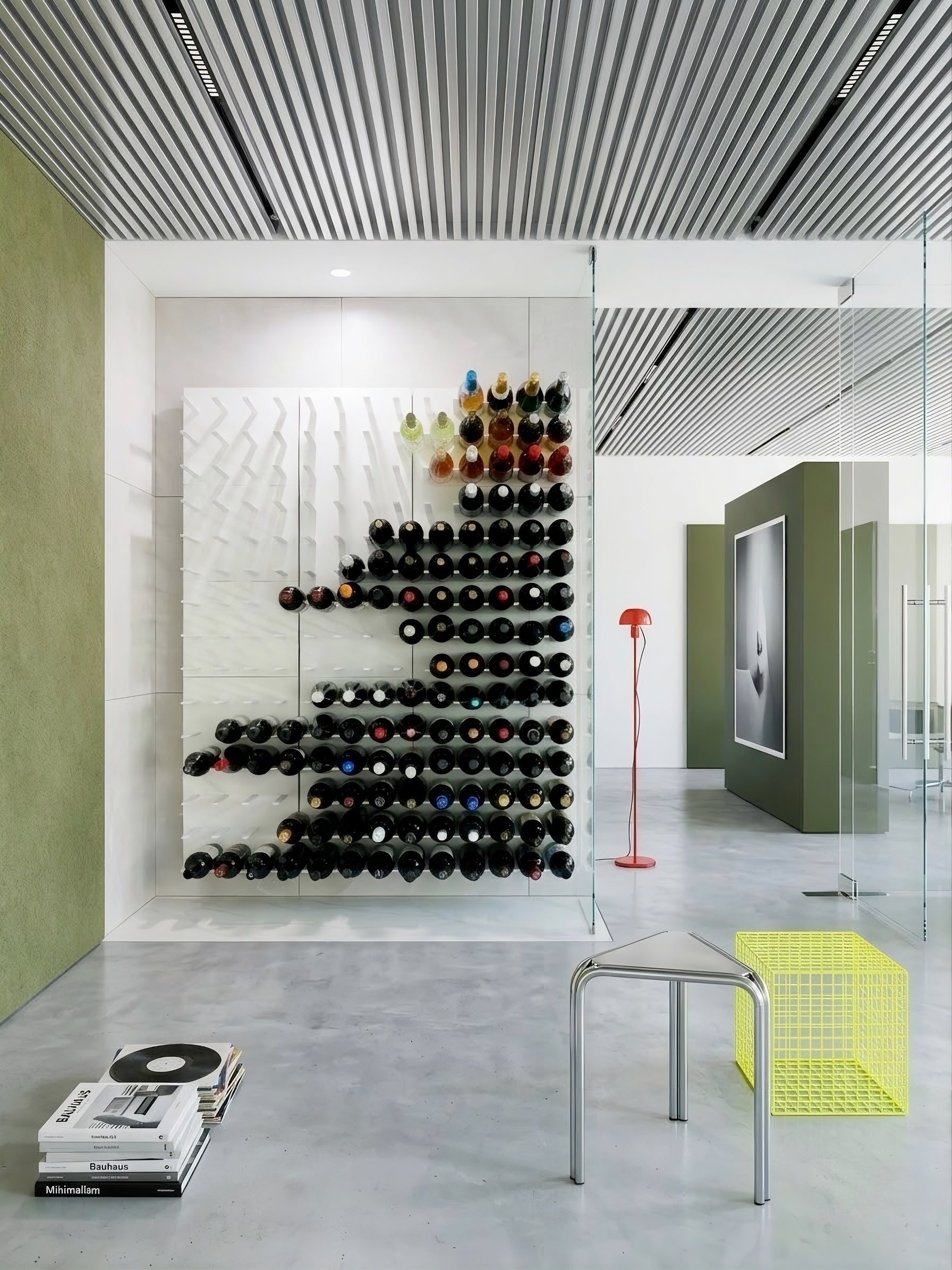 Sleek minimalist wine room with STACT Premier WhiteOut wall-mounted wine racks.