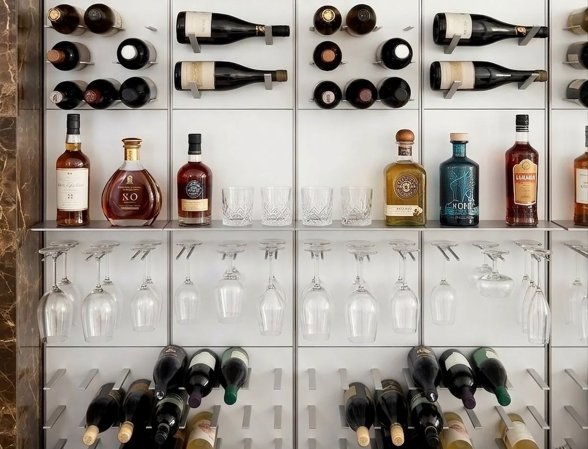 White and silver STACT Premier wine wall with integrated stemware racking and display shelves.