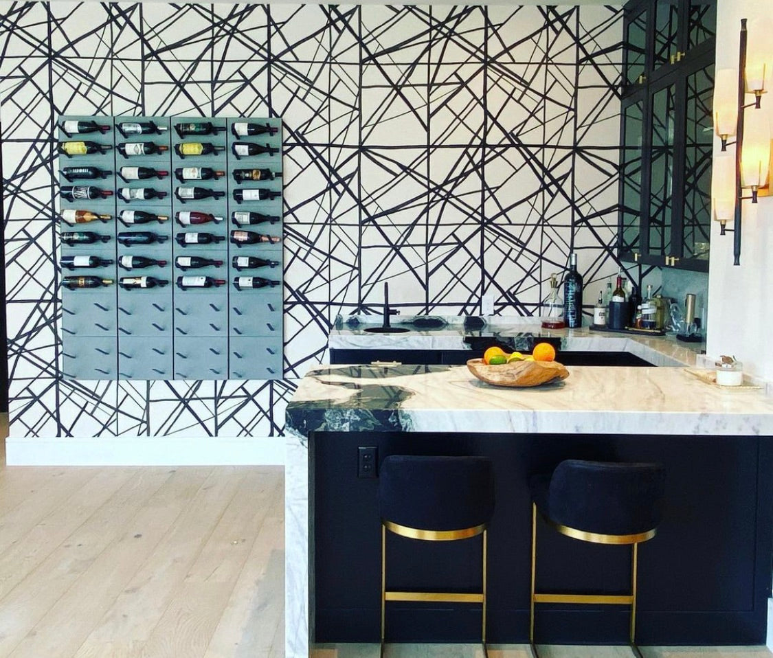 STACT Premier Concrete & Black label-forward wine display with a concrete-look panel and black hardware.