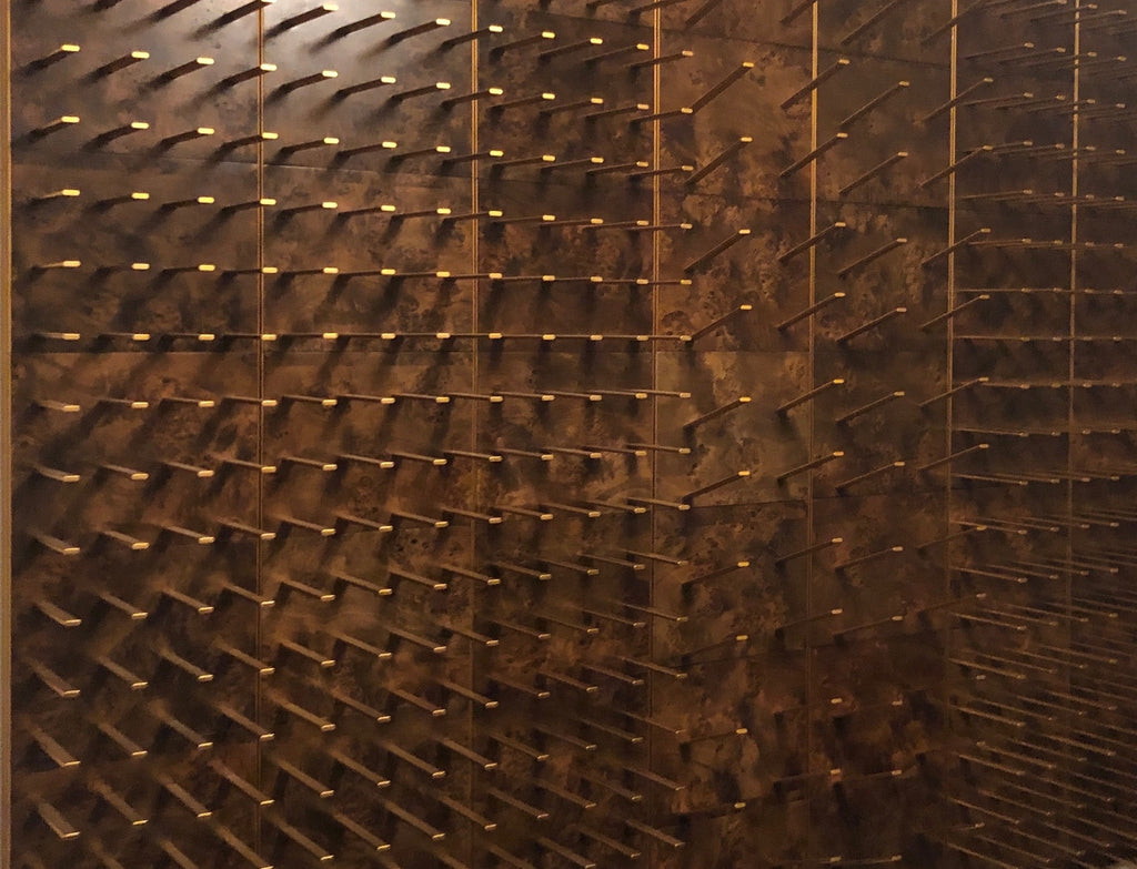 burled wood wine wall panels and pegs